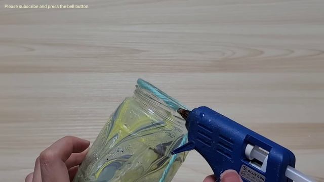 I did an INCREDIBLE job with the glass bottle, yarn, nail polish. DIY recycling craft ideas
