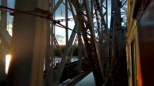 Александровский железнодорожный мост через Волгу вид из окна закат в Самарской области