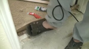 Installation of a flooring transition strip on concrete