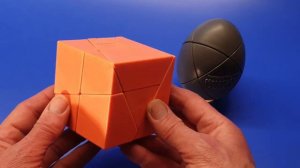 Orange "Golden" Cube & Grey "Golden" Egg puzzles (past auctions)