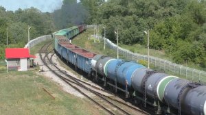 Пассажирский вагон в составе грузового поезда