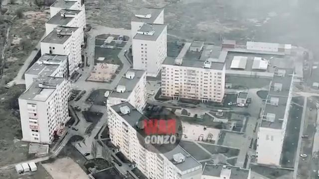Боевик батальона Азов который разместил ПТРК на крыше жилого дома а так же техника ВСУ во дворе