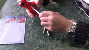 Стриппер - инструмент для удаления изоляции с коаксиального кабеля KNIPEX KN-166006SB