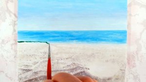 Рисование ракушки с жемчужиной на песке.