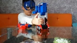 Оптимус на пульте управления, игрушки трансформеры для детей