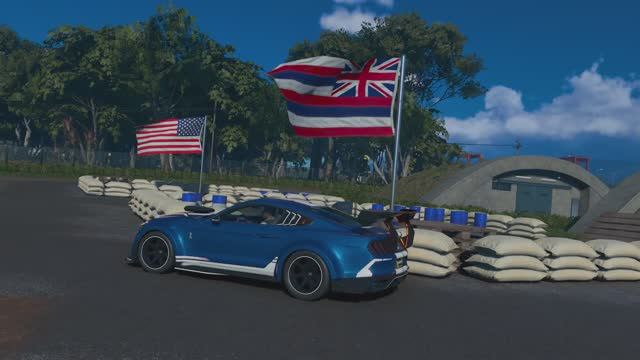 Бункеры и гавайский флаг военного лагеря Эвы находятся тут в The Crew Motorfest