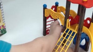 Genevieve Plays with Locking Wooden Dollhouse!