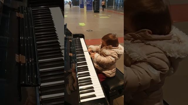 Playing the piano at Tiburtina Station in Rome