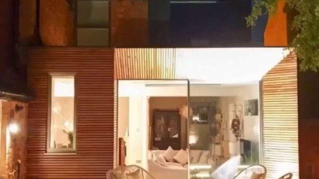 Деревянные рейки в отделке фасада дома