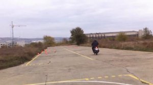 Сдача экзамена змейка на мотоцикле