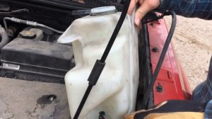 SATURN VUE WINDSHIELD WASHER PUMP REPLACEMENT