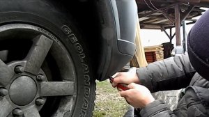 Режем бампер нивы шевроле под резину большего размера или цепи.