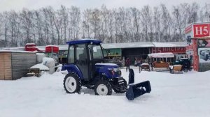 Трактор Русич уборка снега снегоуборщиком