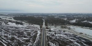 Подтоплена дорога из Белоомута в Слёмские борки (март 2023)