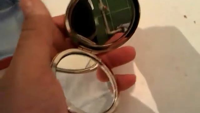 Карманное зеркальце