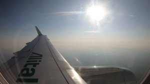 Alitalia cityliner E175 approaching into Milan Bergamo airport in the afternoon