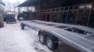 Трехосный прицеп с поворотной осью Львица-3 (платформа для перевозки автомобилей)