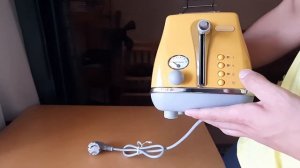 Тостер Delonghi CTOC 2103 жёлтый, обзор, распаковка