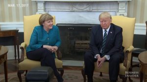 Trump- appears to ignore requests for a handshake with Angela Merkel-