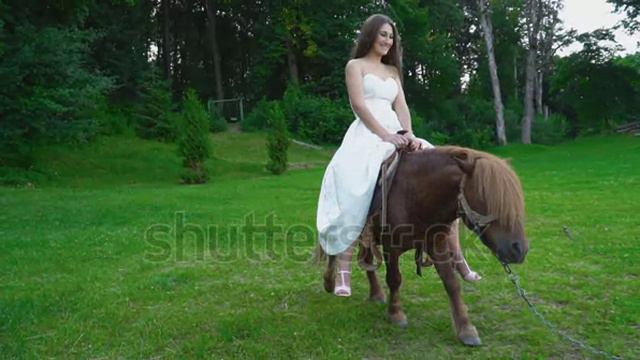 the-girl-is-riding-a-pony