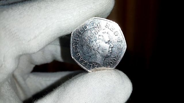 Монета Великобритании 50 пенсов 2007 года / 100 лет со дня основания скаутского движения смотреть онлайн