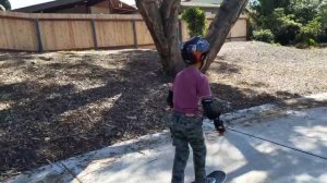 Raymond  first time try the skate board