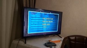 проверяем пульт с гироскопом на телевизоре novex