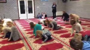 Dutch children learning how to pray to Allah