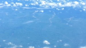 Вид из окна самолета на Гималаи