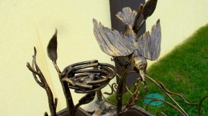 Красивая подставка для цветов на улице из металла ковка