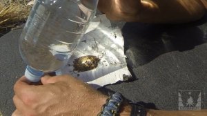 Получение огня с помощью бутылки с водой