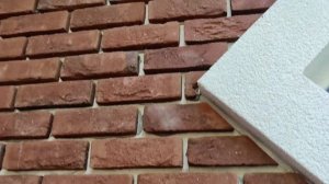 Облицовка фасада клинкерной плиткой из кирпича ручной формовки, затирка швов декоративная штукатурк