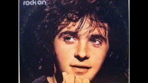 Rock On by David Essex at number 13 on The American Top 40 Radio Show with Casey Kasem in March 197