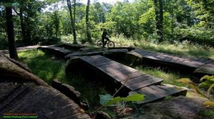 cross-country with CUBE hardtail e-bike on stone obstacle / Outdoor MTB Park - Oldenzaal netherland