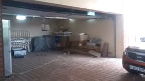 Секционные ворота с автоматическим приводом в Шымкенте
