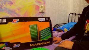 Степа выбирает нерф бластер в детском мире….