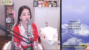 Китаянка поет Despasito