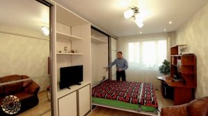 Шкаф-кровать трансформер в исполнении с подъемной кроватью для гостиной и спальни в одной комнате