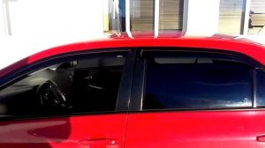 Toyota Corolla. Доводчик стекол на 4-х дверях.