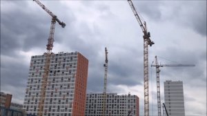 Стройка. Башенный кран КБ 515. Башенный кран POTAIN. ЖК Амурский Парк. Вид с высоты