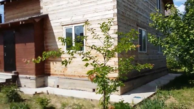 Обзор дома(Отделка стен фасада деревянного дома из бруса фасадными панелями ОДИНЦОВО)