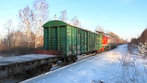 2ТЭ116-1647 с грузовым поездом на Тавду