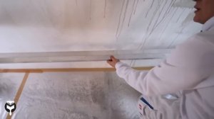 Проверка качества штукатурки стен перед малярными работами