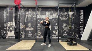 Приседания с гирями на груди