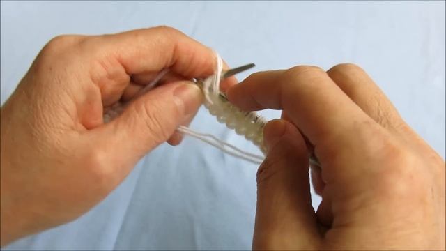 Шарф спицами простым узором.