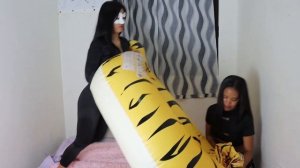 Kate And Stella Deflate A Huge Inflatable Tiger