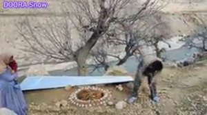 life of nomads:baking bread in oven by a young couple,mountain shelter 2024