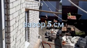 утепление пеноизолом деревянного дома обложенного кирпичом