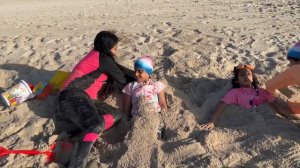 Shfa swims at sea with friends