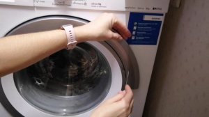Как открыть люк на стиральной машине